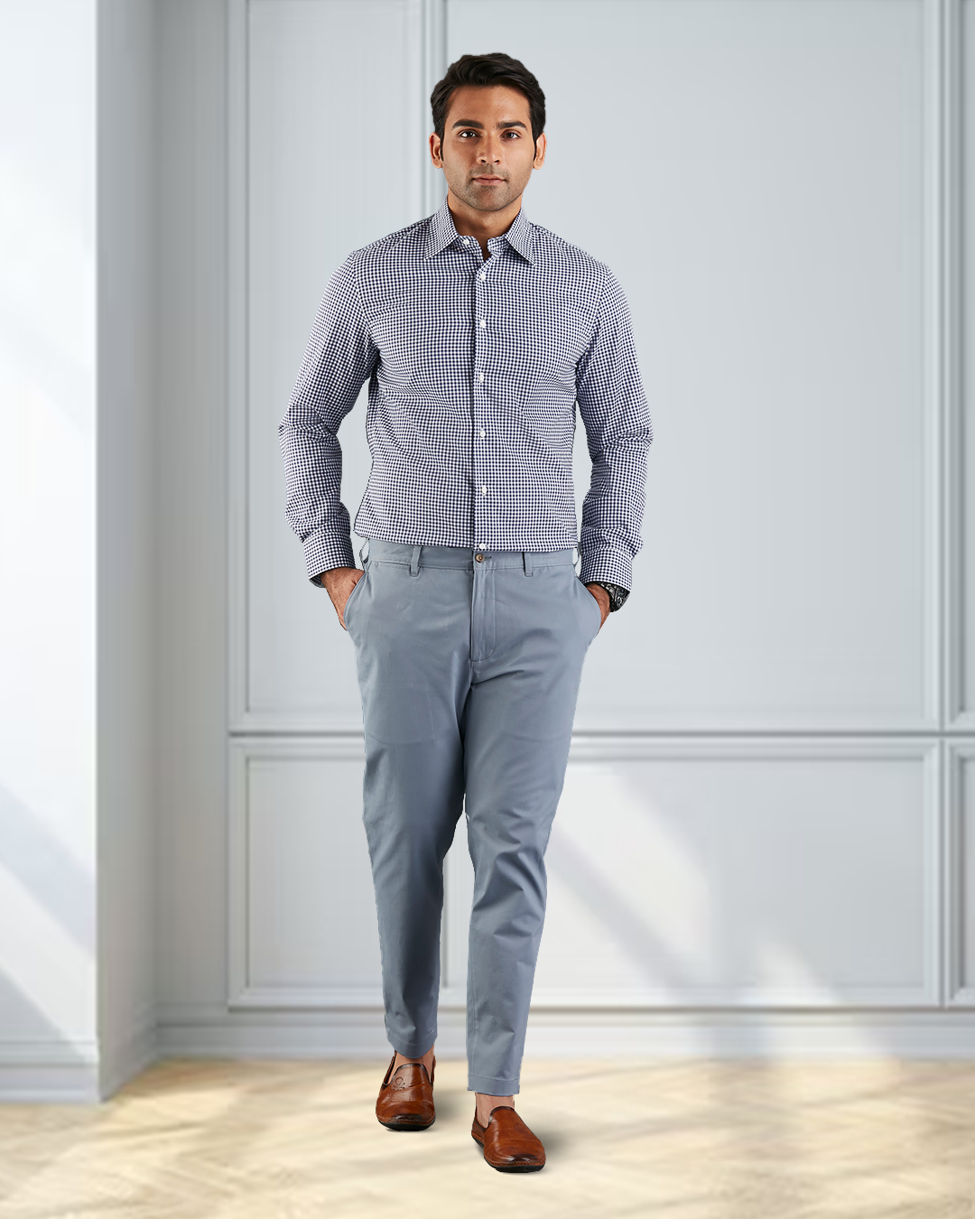 Front view of model wearing custom Genoa Chino pants for men by Luxire in soft blue grey