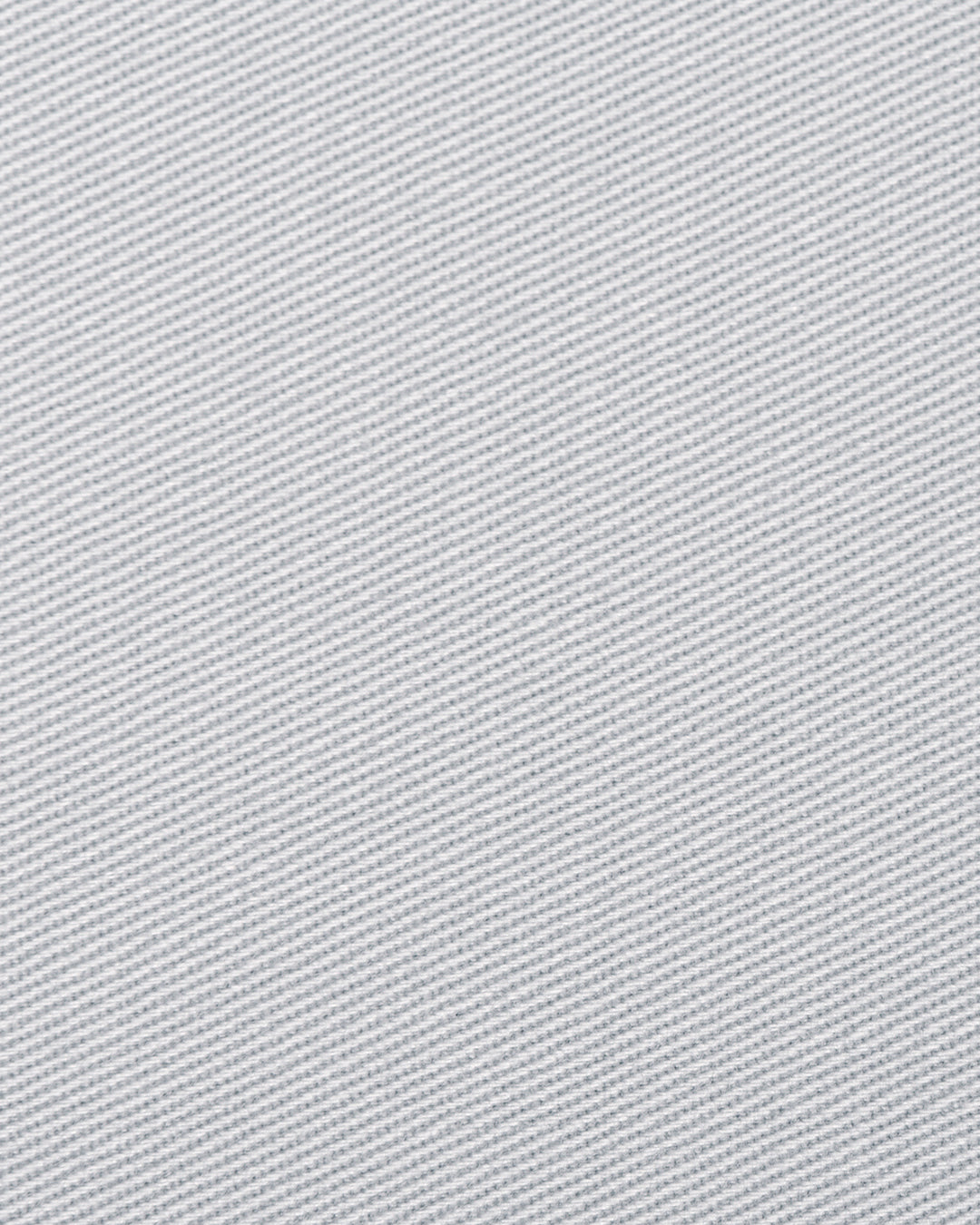 Close up view of custom Genoa Chino pants for men by Luxire in light grey