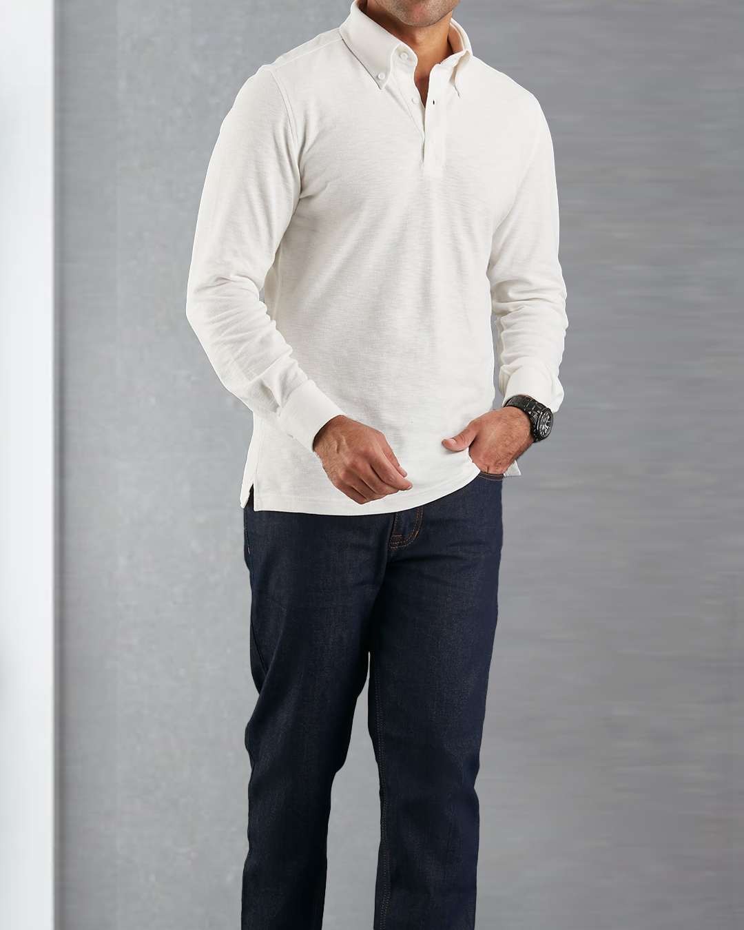 Model wearing the custom oxford polo shirt for men by Luxire in ivory white