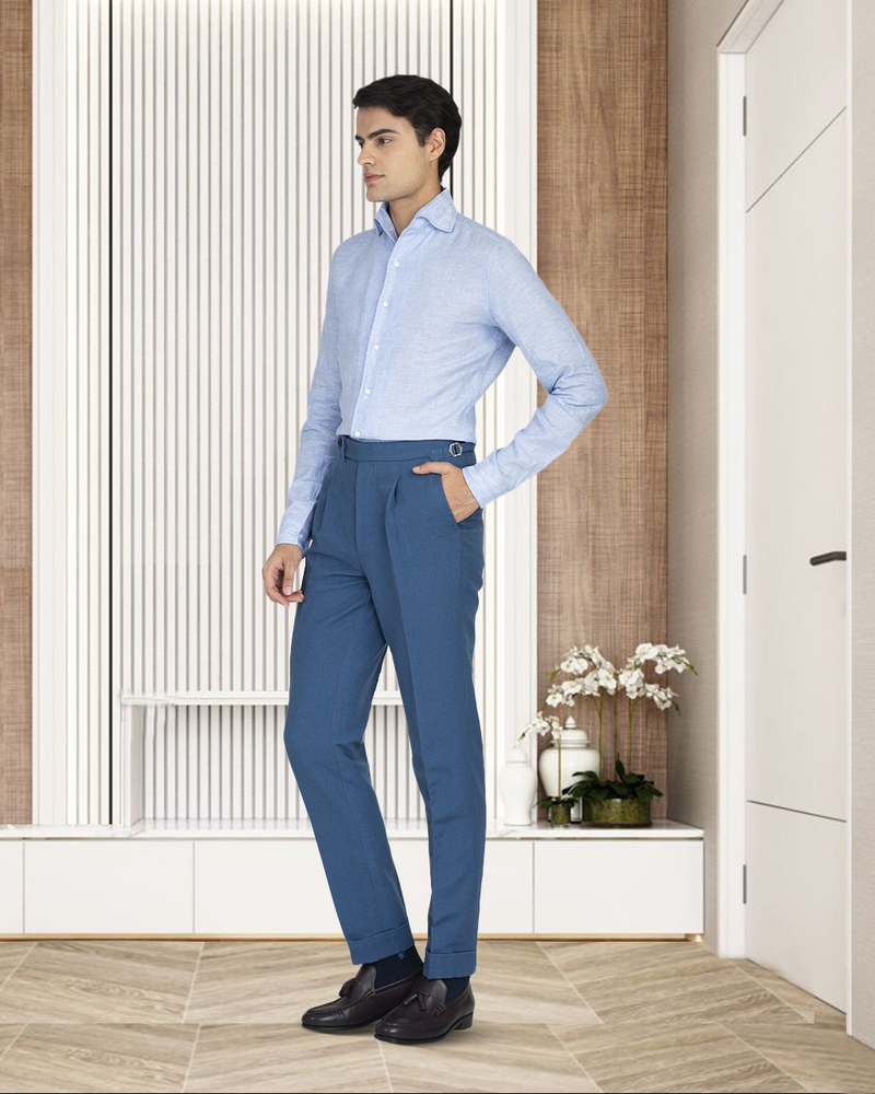 Model wearing the custom linen shirt for men in light blue chambray by Luxire Clothing 5