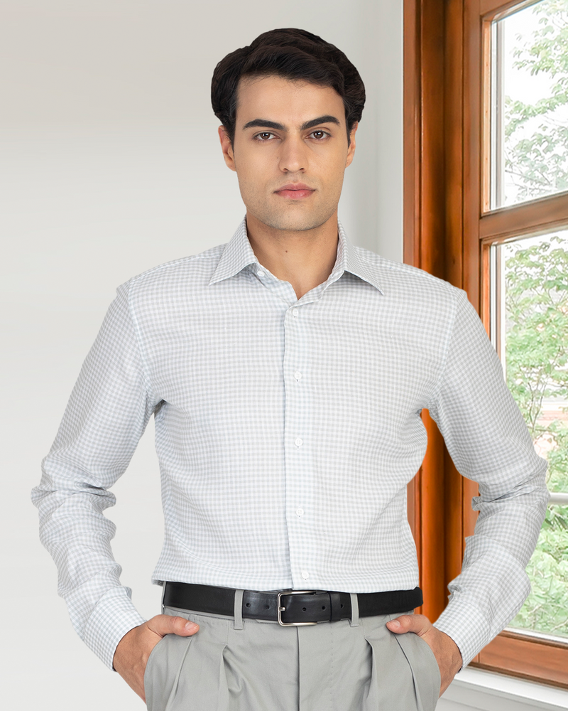 Model wearing the custom linen shirt for men in greenish grey by Luxire Clothing