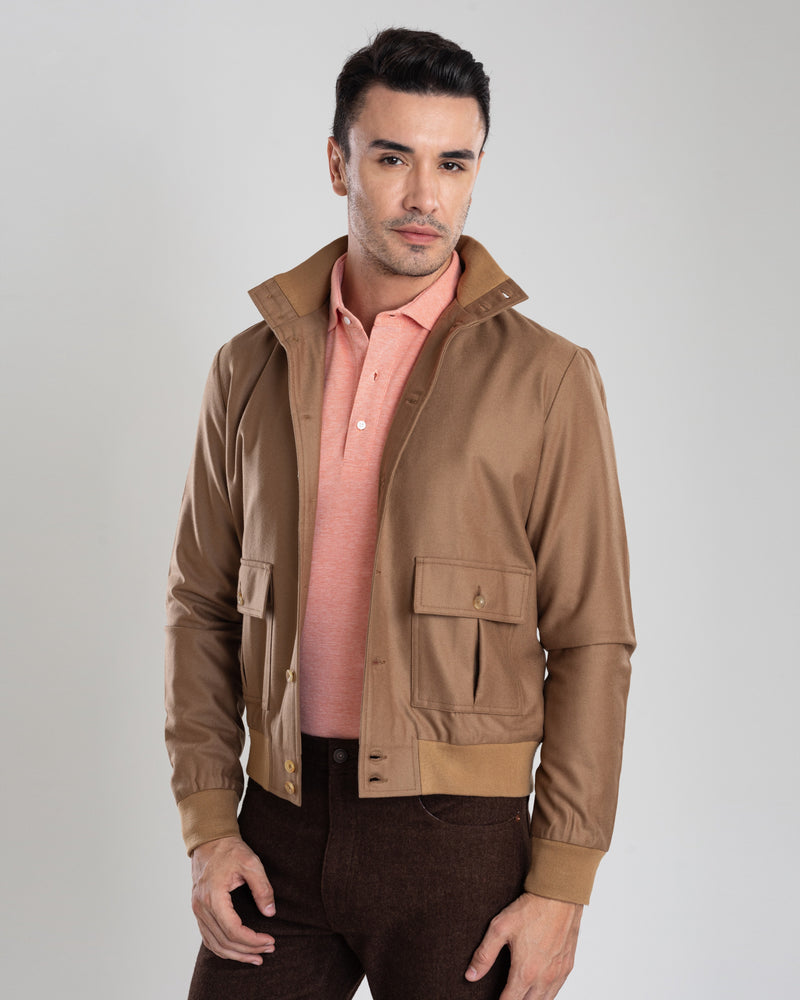Model wearing the flannel shirt jacket for men by Luxire in sand with rib collar