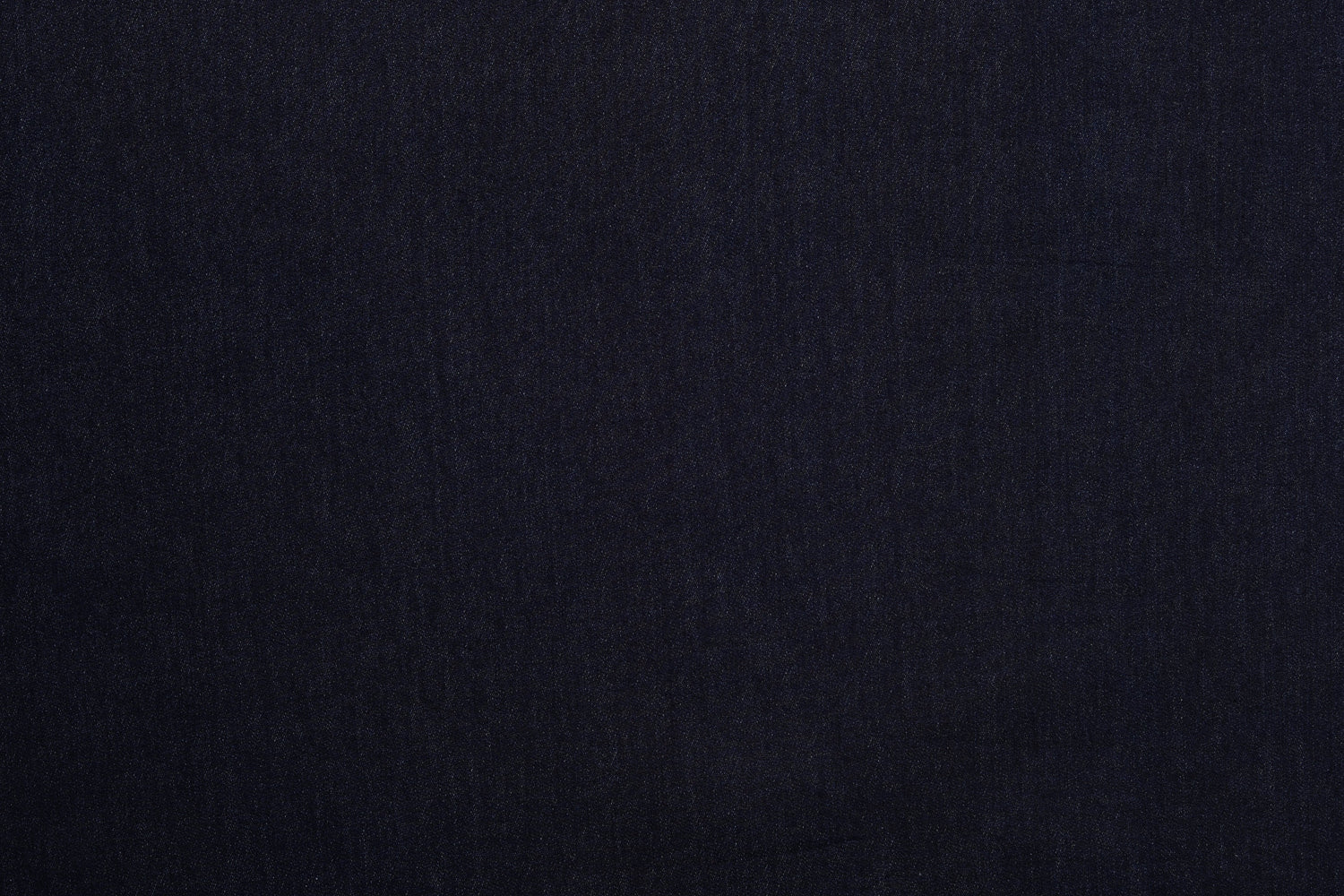 Close up view of stretchable jeans for men by Luxire in dark navy