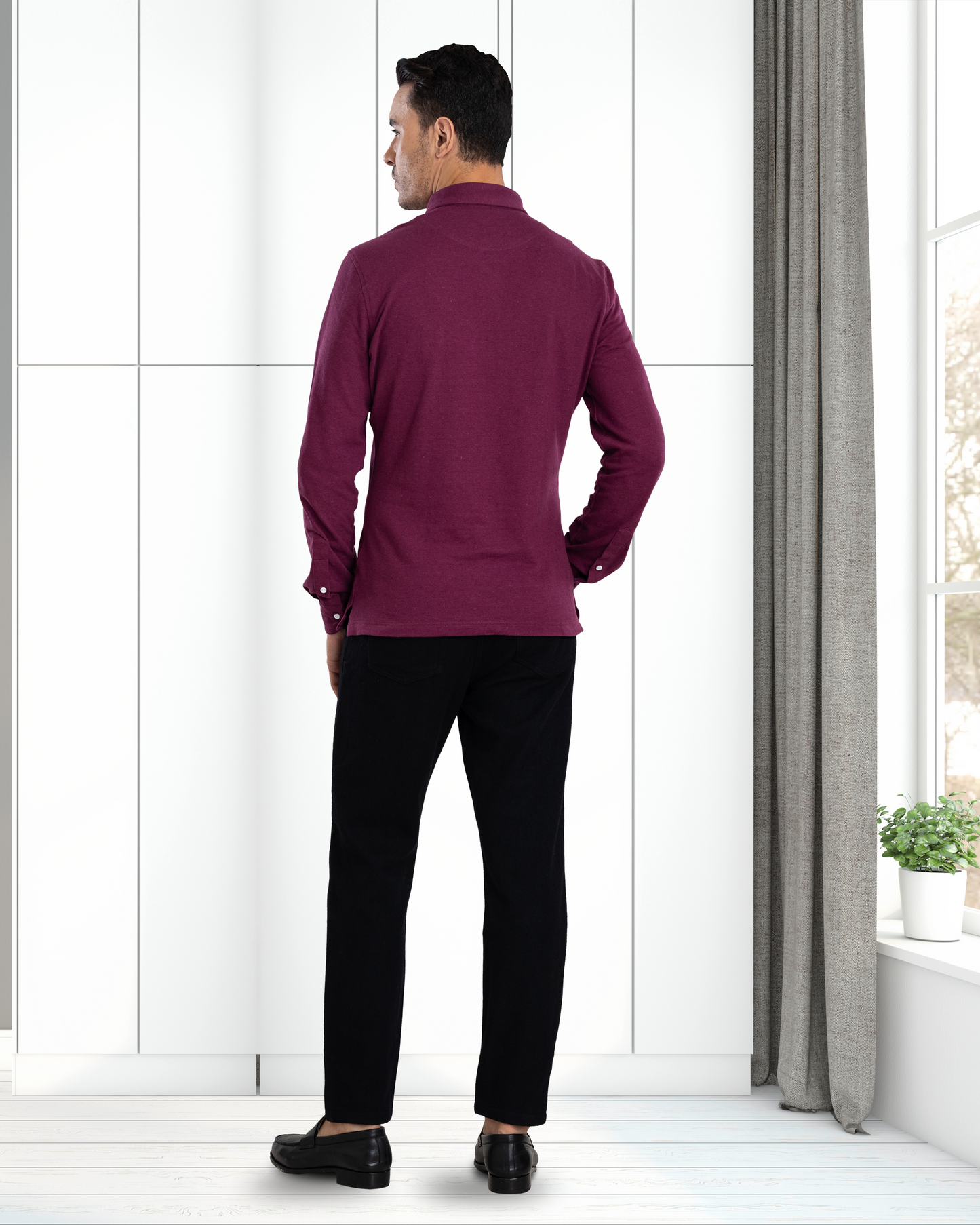 Back of model wearing mens wool jeans by Luxire in black